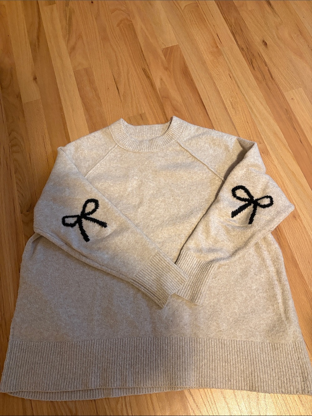 Aerie unreal Cozy Cream Sweater with Black Bow Elbow Patches